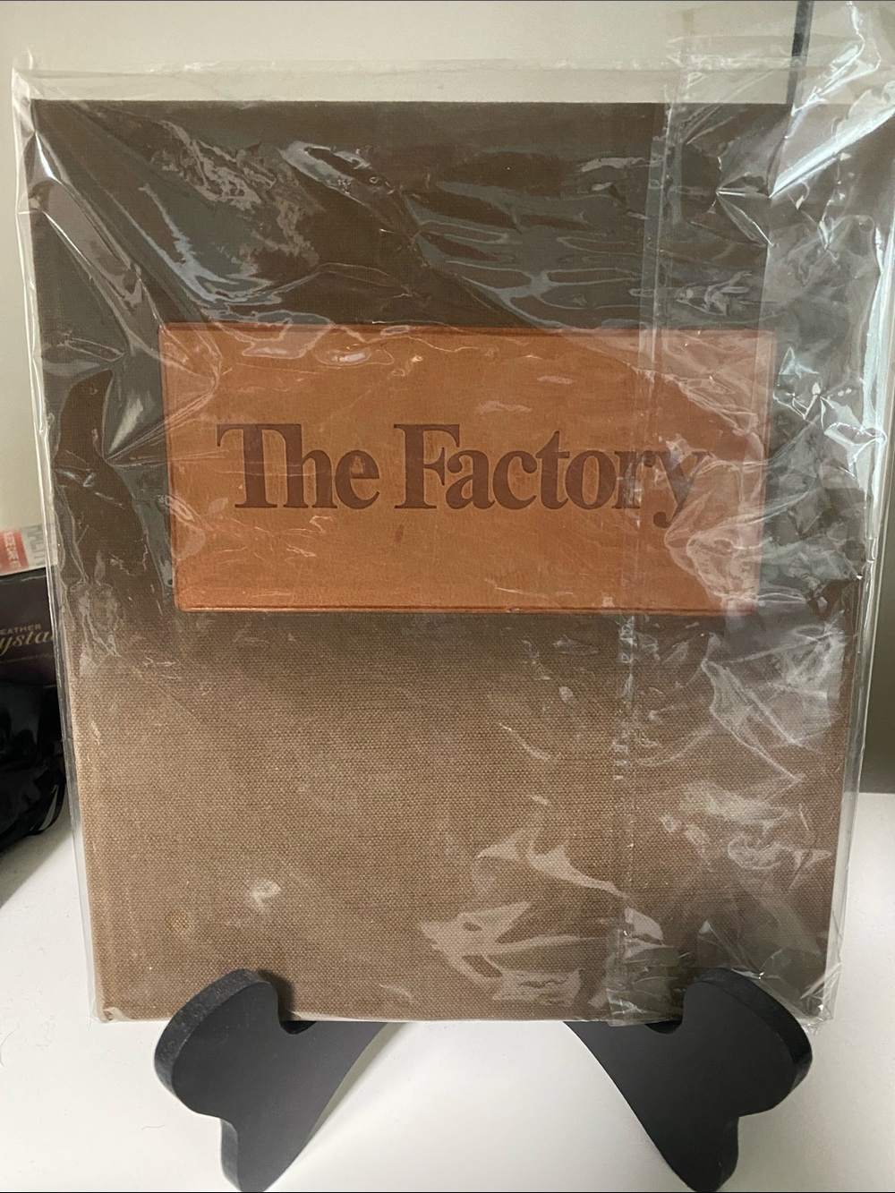Rare and Highly Collectible The Factory Book with Tan Leather Plaque